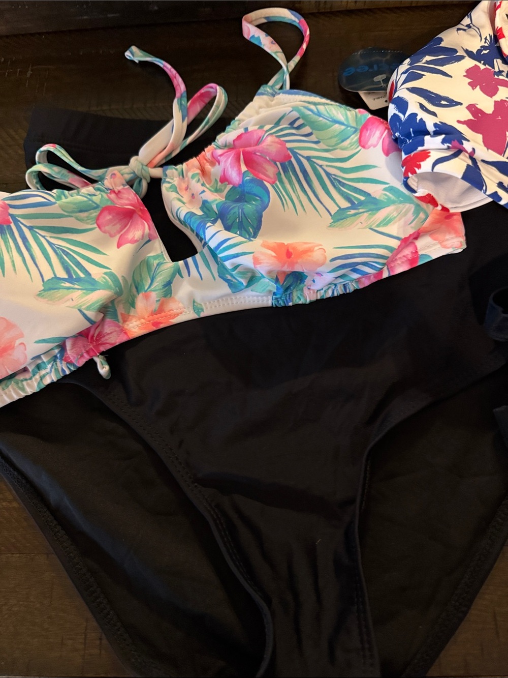 Lot of two bikini tops and two bottoms.